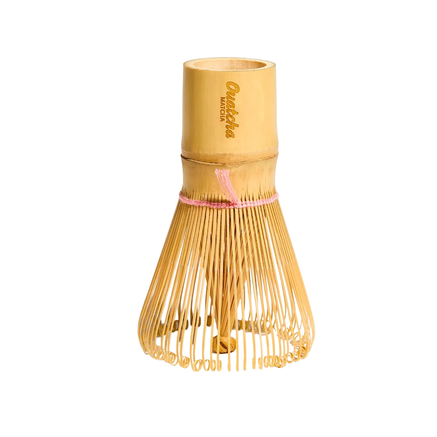 Bamboo whisk with engraved Ouatcha Matcha logo on a white background